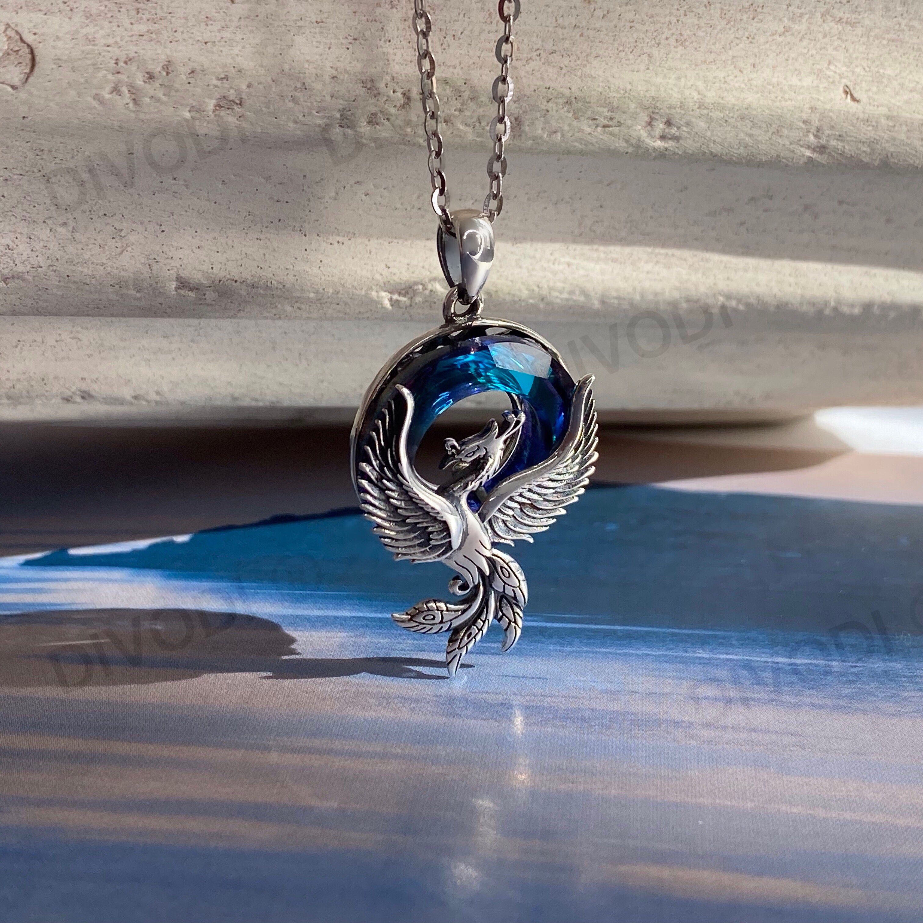 Phoenix Silver with Blue Crystal Pendant Necklace